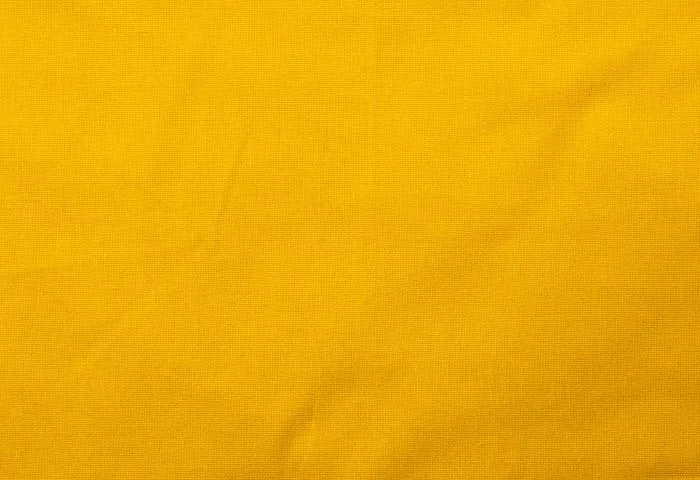 Bomullskasse, 140 g/m², närbild av tyget – gul