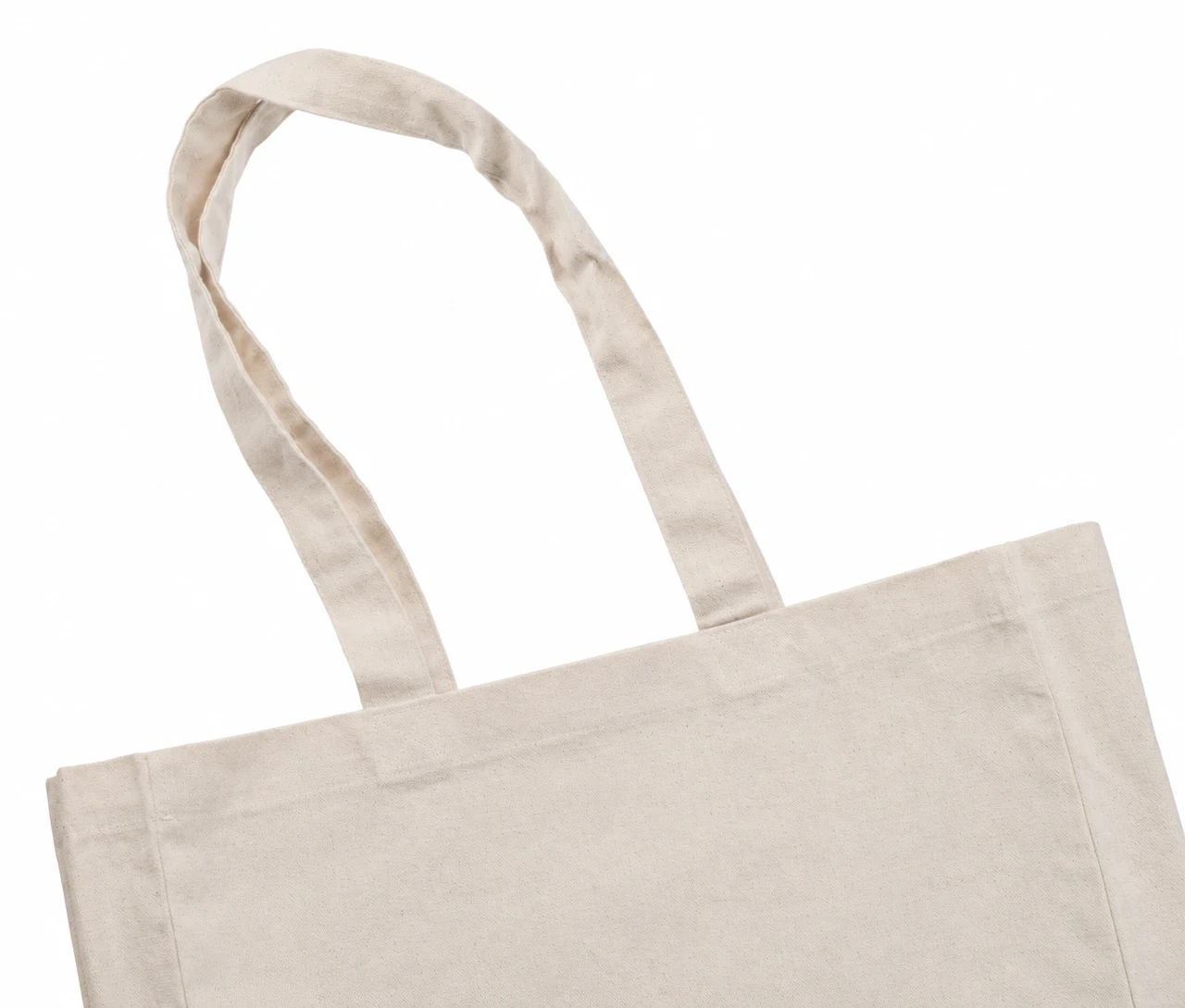 Bomullskasse, 35 × 35 cm, närbild av handtagen och sömmarna – natur